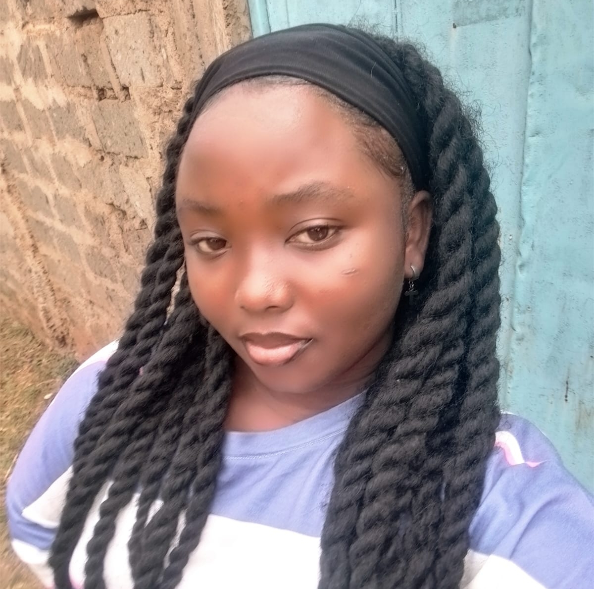 Zuleah Saenyi, Treasurer of OUT Organization